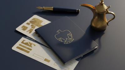 Editorial flat-lay of a generic UAE-style passport, gold-coloured visa-stamped page, fountain pen, and dallah coffee pot on dark navy